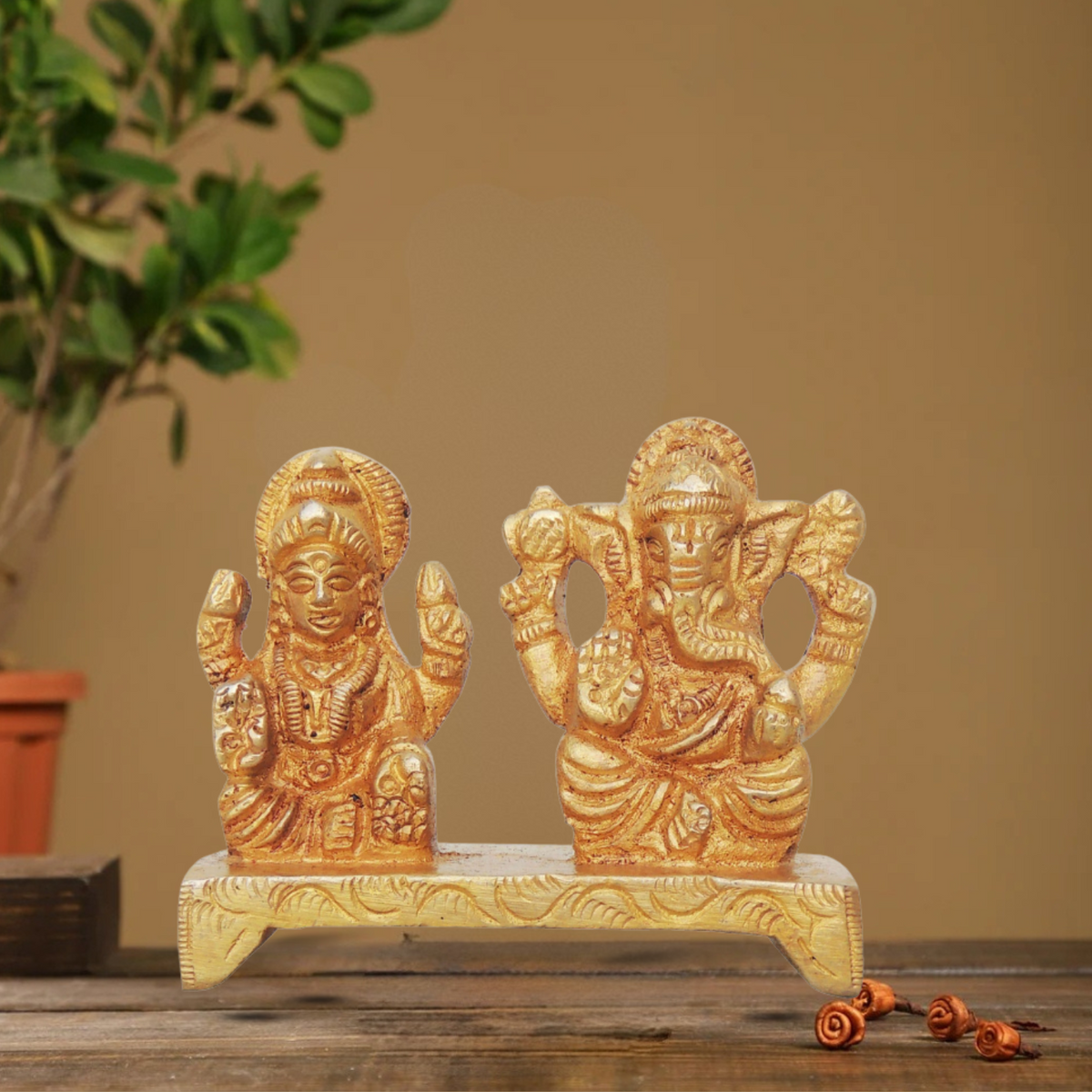Brass Laxmi Ganesh One Base Statue 0.175Kg - PUSHMYCART
