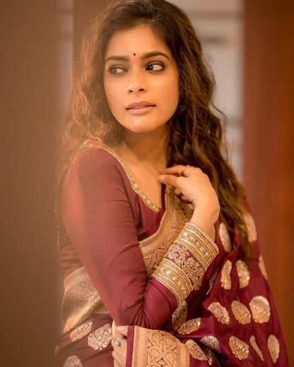 Vasthrlay Traditional Saree in Maroon with refined banarasi ethnic appeal