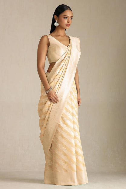 Vasthrlay Tussar Cream Saree with decorative Traditional design
