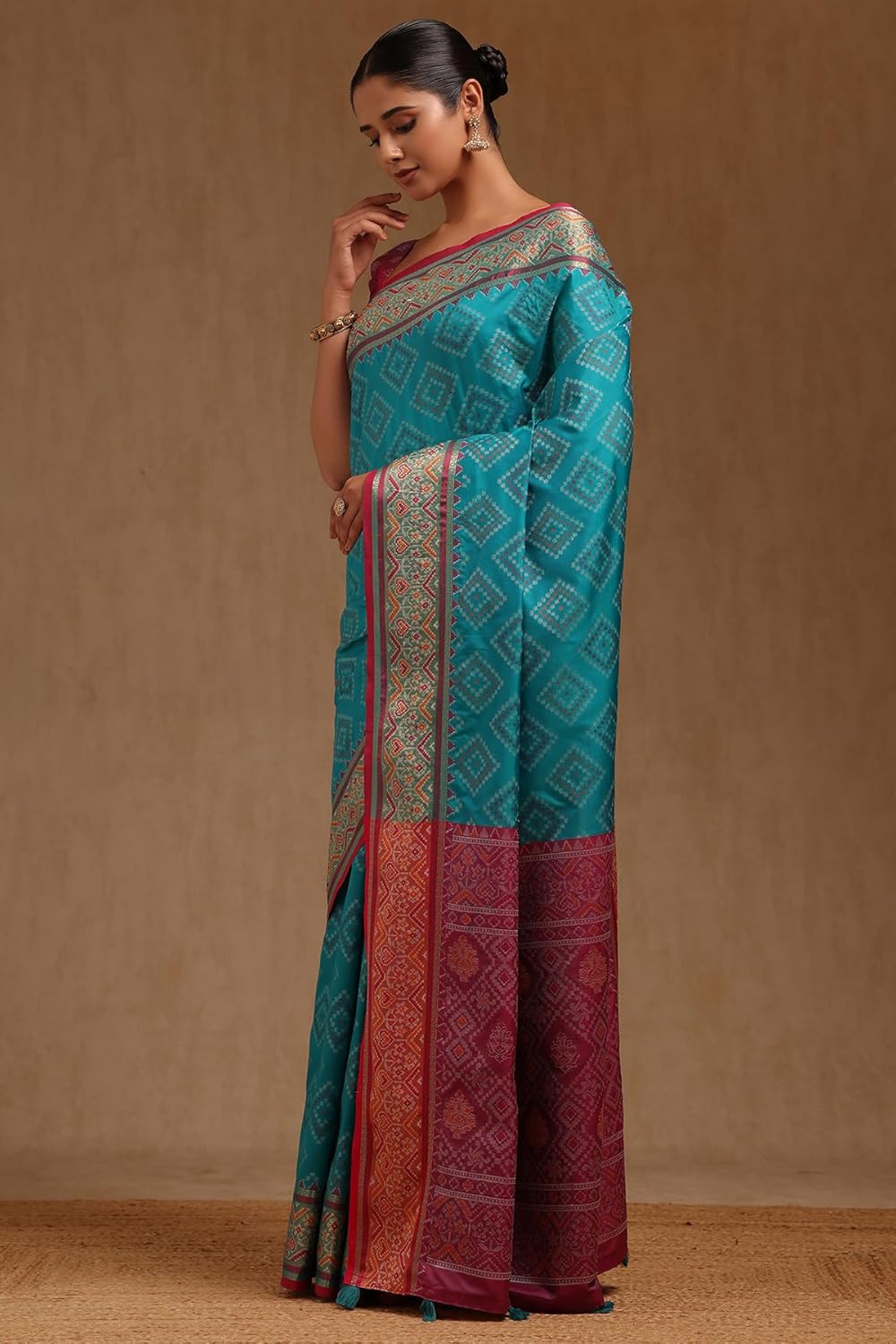 Vasthrlay Ethnic Turquoise Saree with decorative Woven design