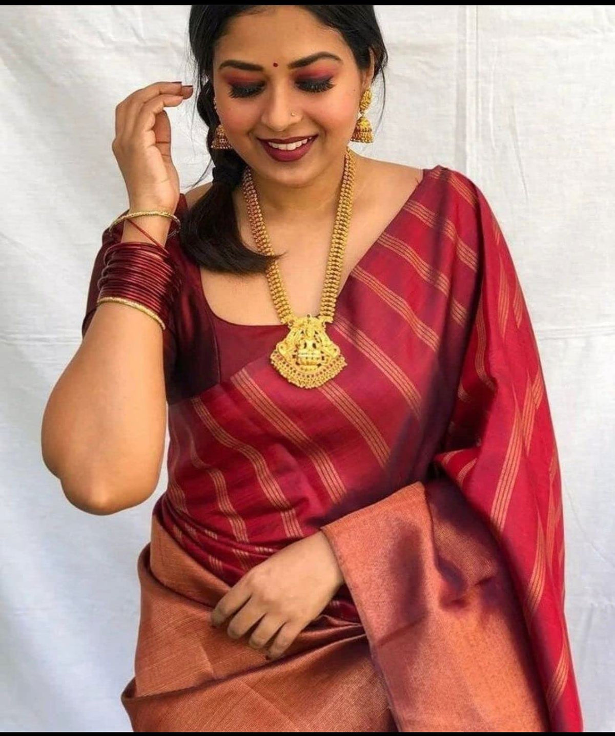 Vasthrlay Maroon Traditional Saree with elegant kanjivaram styling