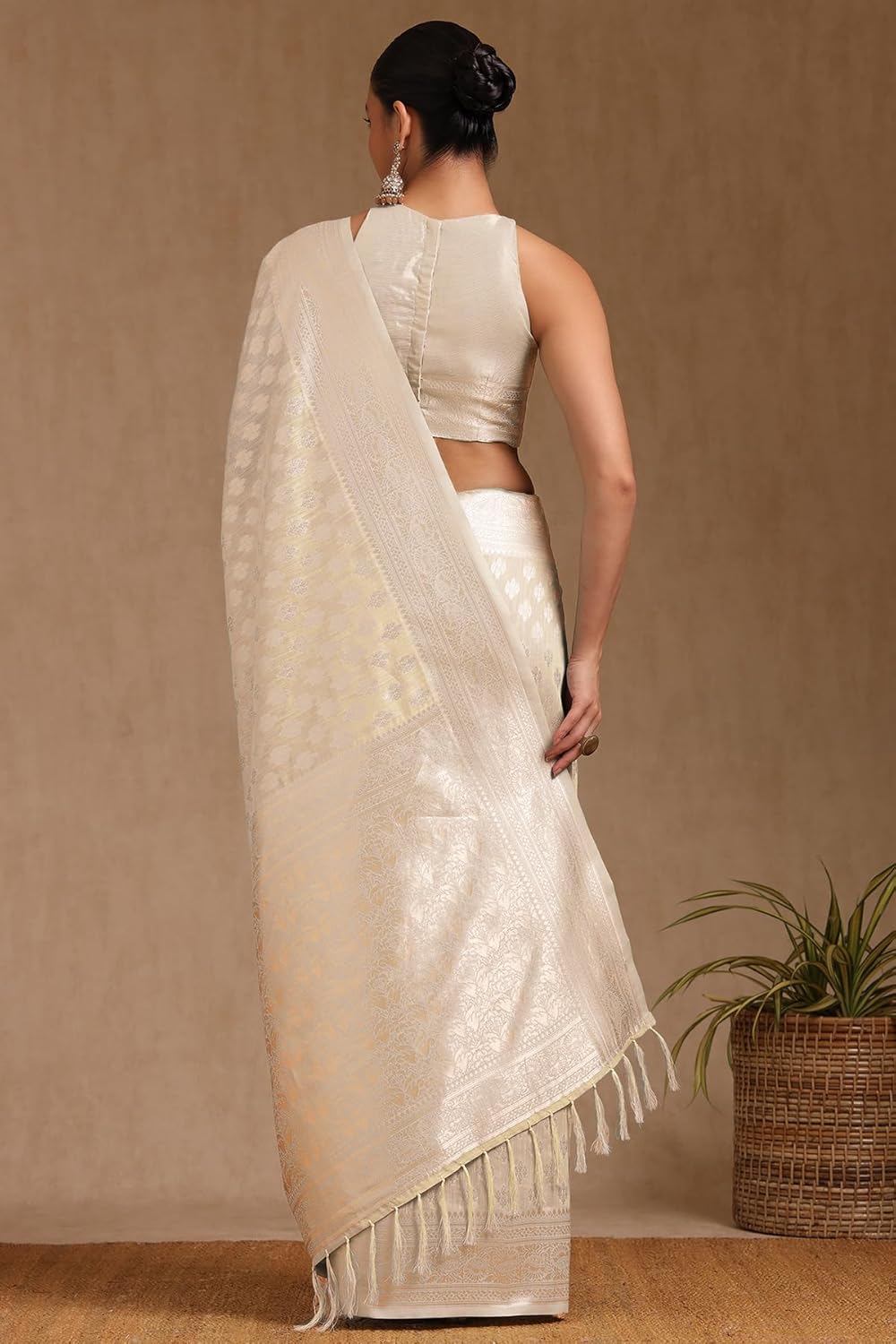 Vasthrlay Tussar Peach Saree with decorative Woven design