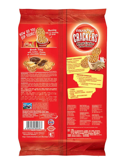 Close-up of several Munchy's crispy wheat crackers, highlighting their golden texture.