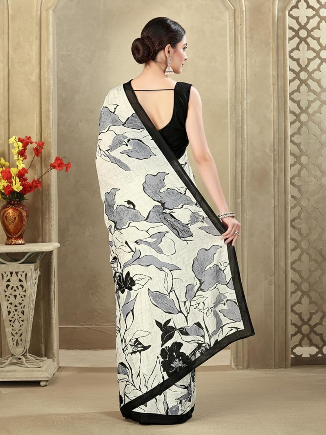 Vasthrlay Ethnic White Saree with decorative printed design