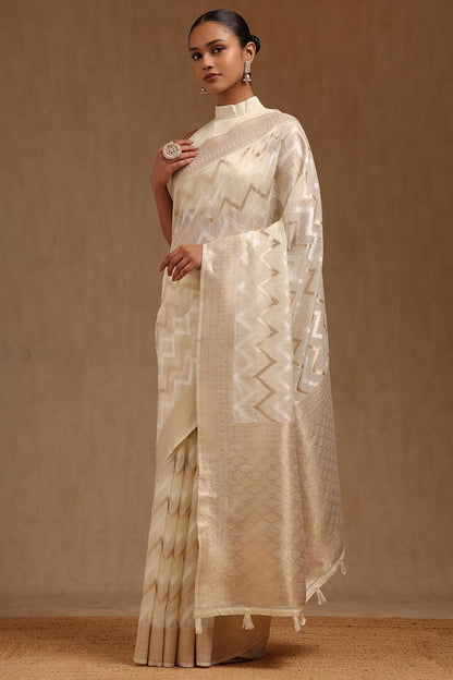 Vasthrlay Linen Cream Saree with decorative Woven design