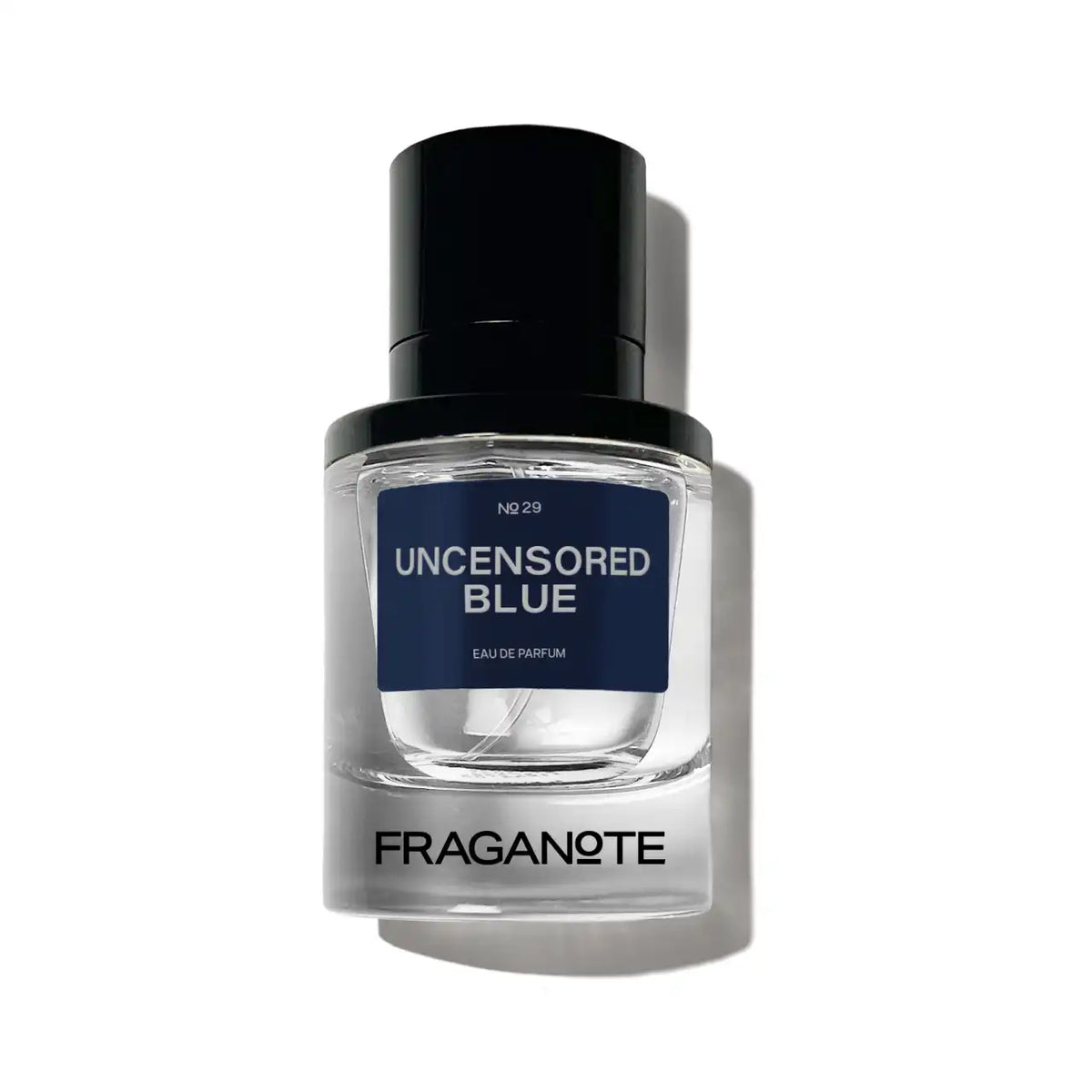 A collection of Fraganote Uncensored Blue perfume bottles, illustrating the product's appeal and availability.