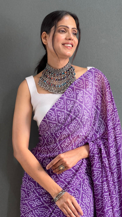 Vasthrlay Georgette Purple Saree with decorative printed design