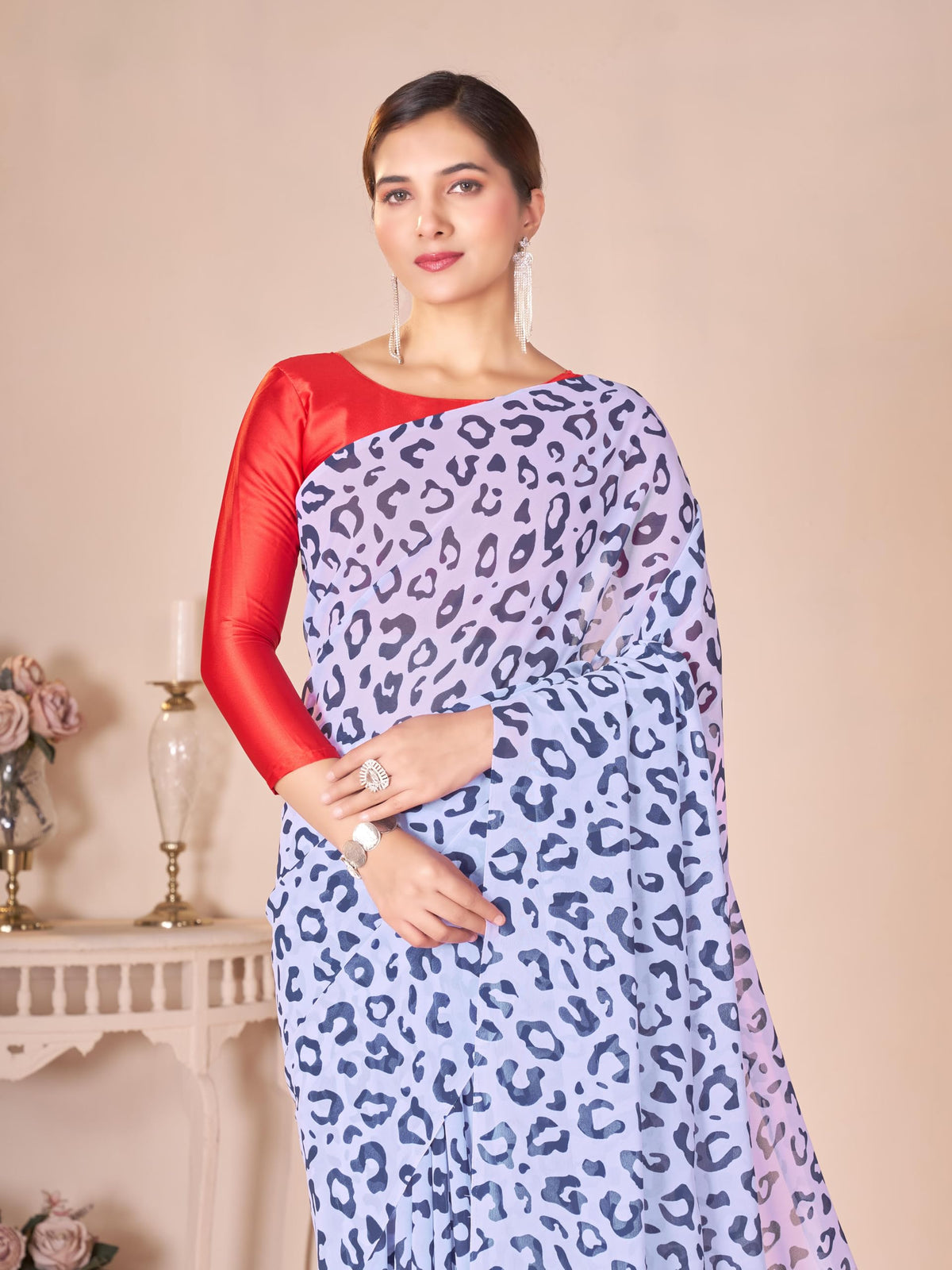 Vasthrlay Georgette Green Saree with decorative traditional design
