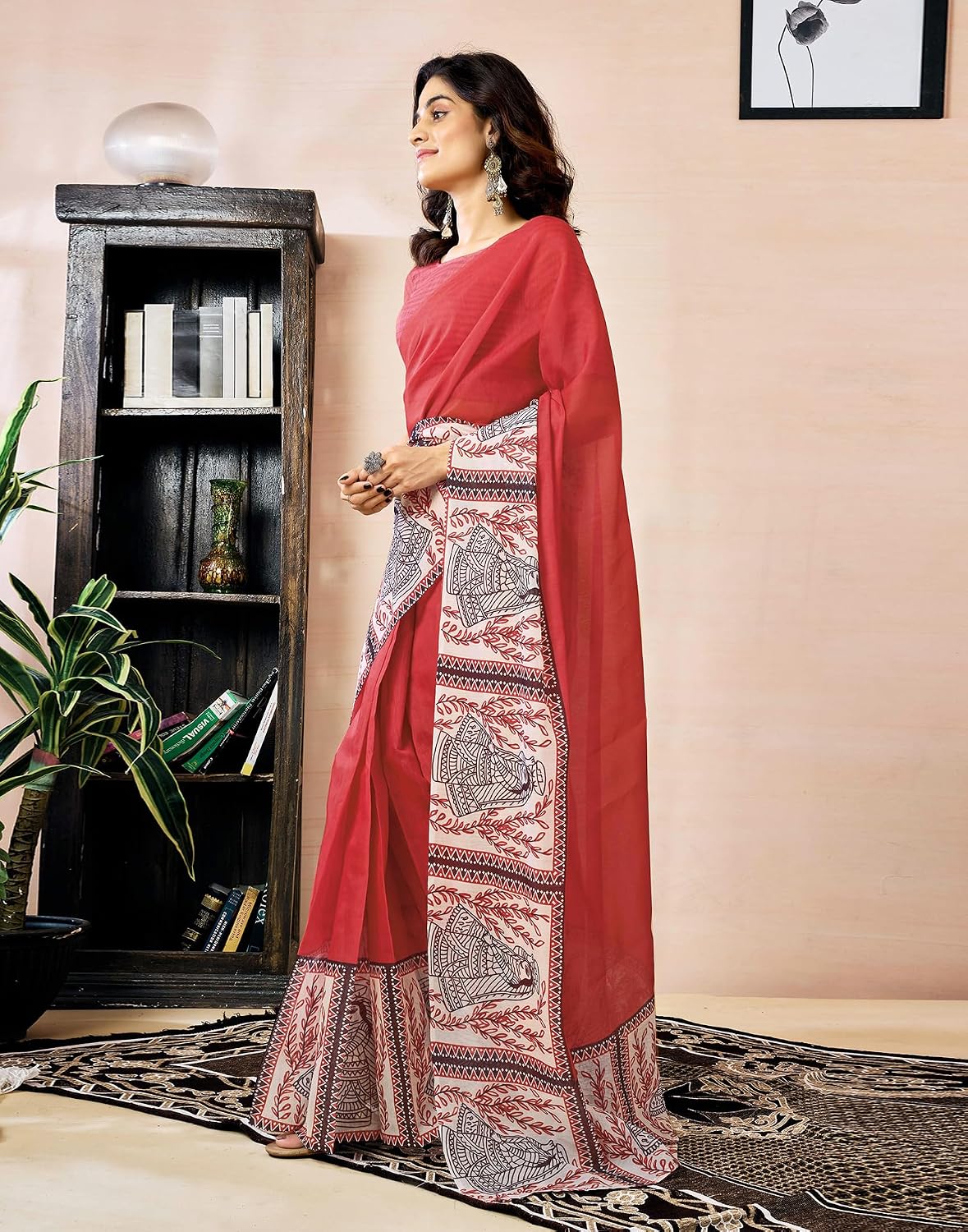 Vasthrlay Orange saree with Printed styling and ethnic look