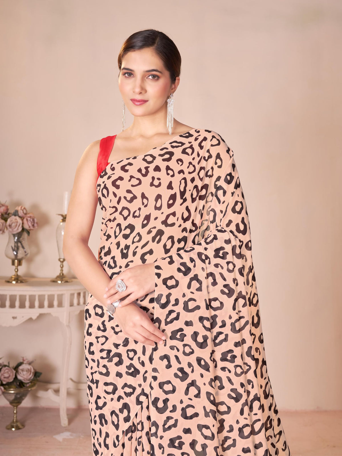 Vasthrlay Georgette Green Saree with decorative traditional design
