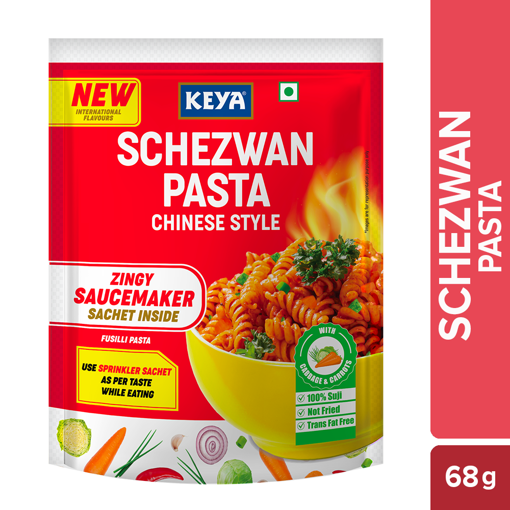 Keya Schezwan Pasta Chinese Style pack with cooked pasta in a bowl, garnished with spring onions. - Image 2