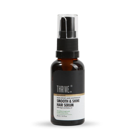 Thriveco Exclusive Smooth & Shine Hair Serum bottle with Argan and Mahua Oil, showcasing glossy, healthy hair.