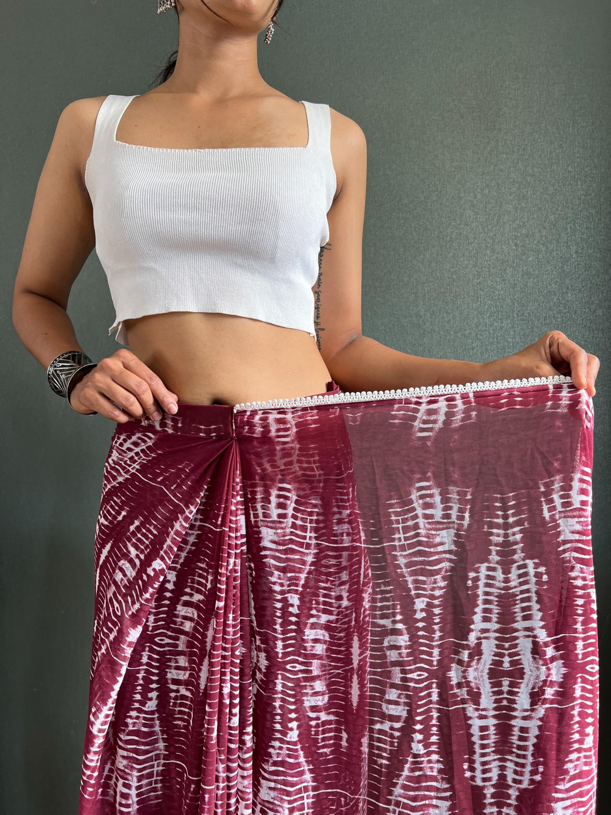 Vasthrlay Georgette Maroon Saree with decorative printed design