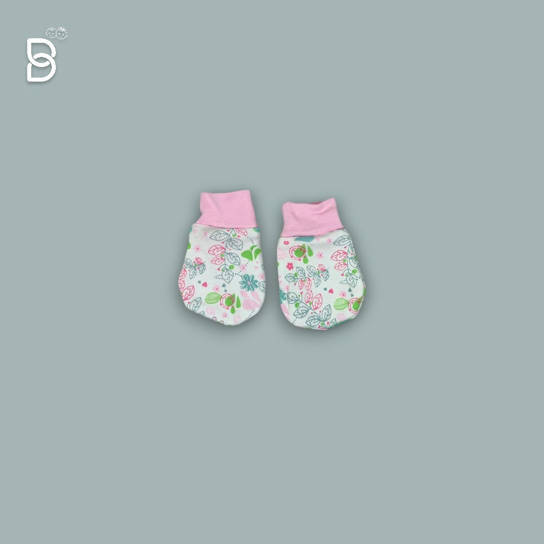 Parent dressing a baby in a soft cotton outfit