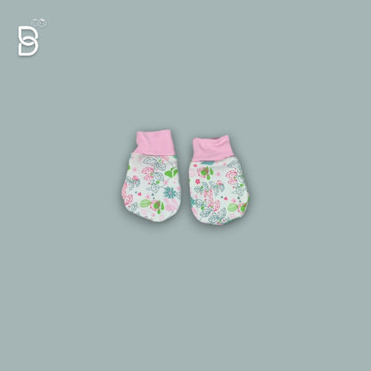 Parent dressing a baby in a soft cotton outfit