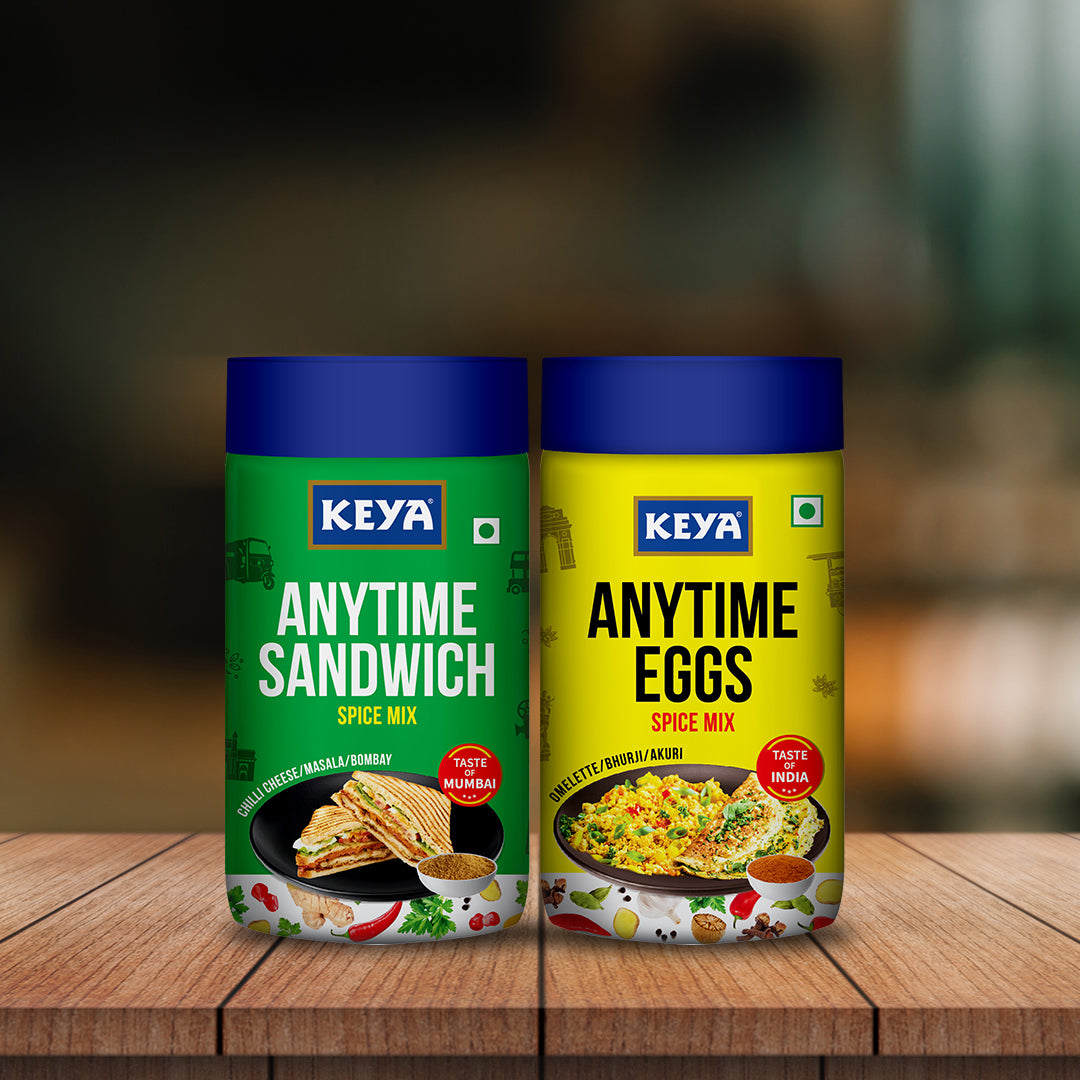 Keyafoods Keya Anytime Culinary Combo Pack with Sandwich and Eggs Spice Mix bottles on a kitchen counter.