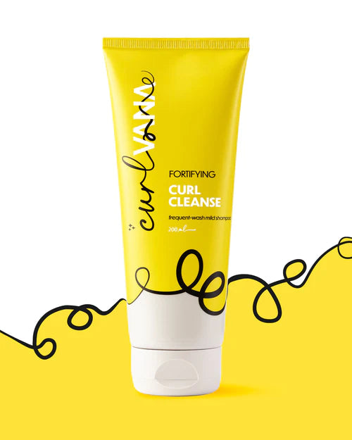 Curlvana Fortifying Curl Cleanse Shampoo bottle with rich lather, emphasizing gentle cleansing and curl care. - Image 2