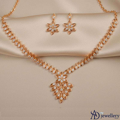 Close-up of the necklace's floral pendant with diamond details