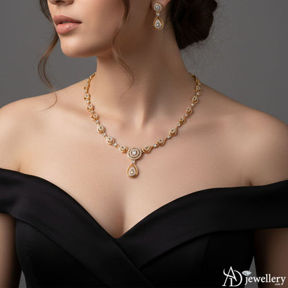 Golden teardrop necklace with sparkling stones