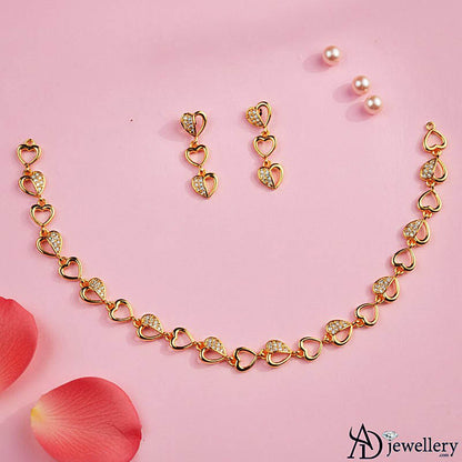 Close-up of the heart pendant detail on the necklace