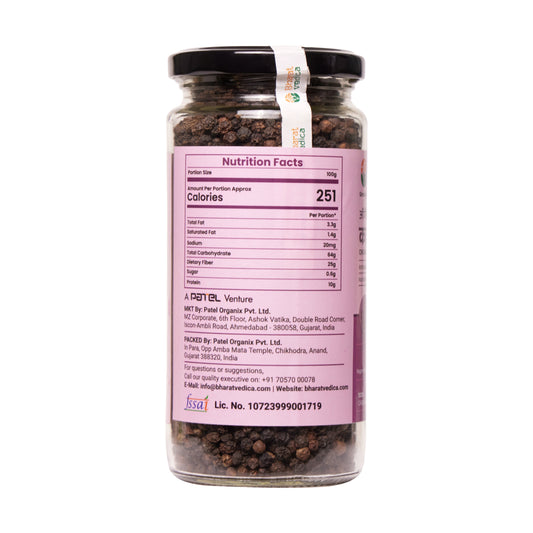 Close-up of Bharat Vedica Organic Black Pepper (Kali Mirch) peppercorns in a wooden bowl, showcasing their bold tex - Image 2