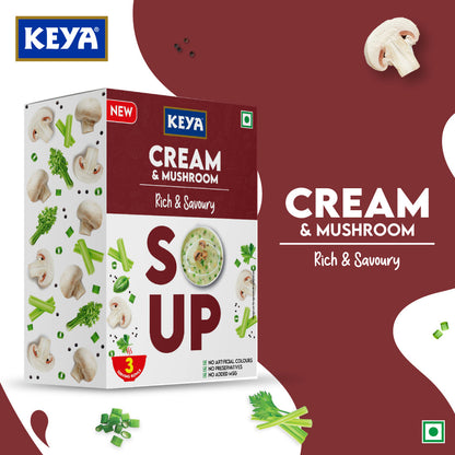 Keyafoods Keya Cream and Mushroom Soup packet next to a bowl of creamy mushroom soup garnished with herbs.