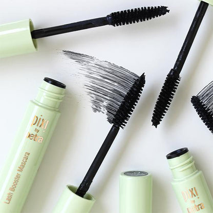 Model wearing Pixi Beauty Lash Booster Mascara, demonstrating enhanced lash volume and definition.
