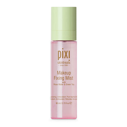 The Pixi Beauty Makeup Fixing Mist bottle on a vanity, highlighting its role in a daily beauty routine.