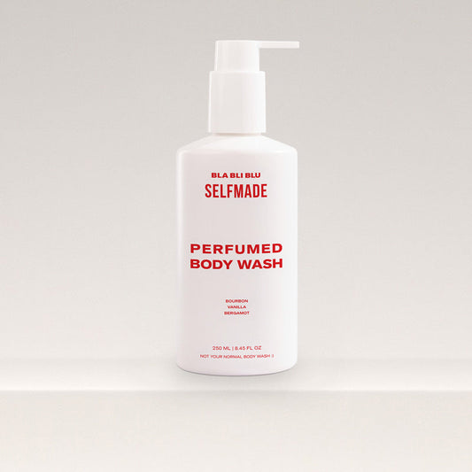 A sleek bottle of Bla Bli Blu Self Made Body Wash, surrounded by soft, inviting light, suggesting luxury and freshness.