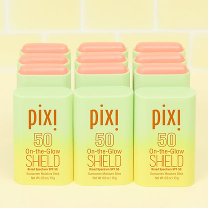 Close-up of Pixi On the Glow SHIELD SPF 50 tube, highlighting product name.