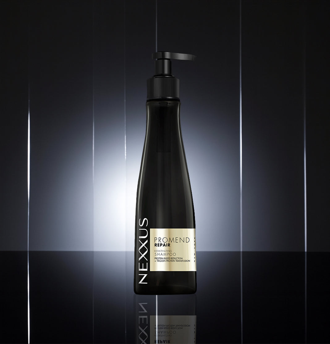 Nexxus PROMEND REPAIR KERATINIZING SHAMPOO bottle, showcasing its advanced formula for damaged hair repair.