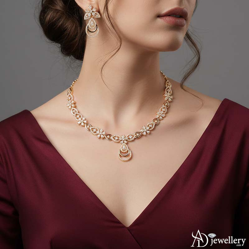 Rose-gold necklace with detailed floral and leaf patterns