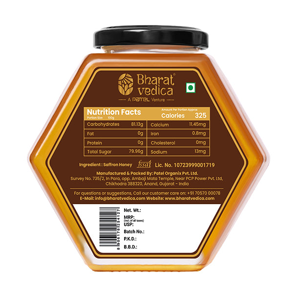 Bharat Vedica Saffron Honey in a signature hexagon bottle, showcasing its rich golden color with saffron strands. - Image 5