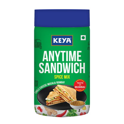Keyafoods Keya Any Time Sandwich Spice Mix jar with a spoon, enhancing a delicious sandwich. - Image 2