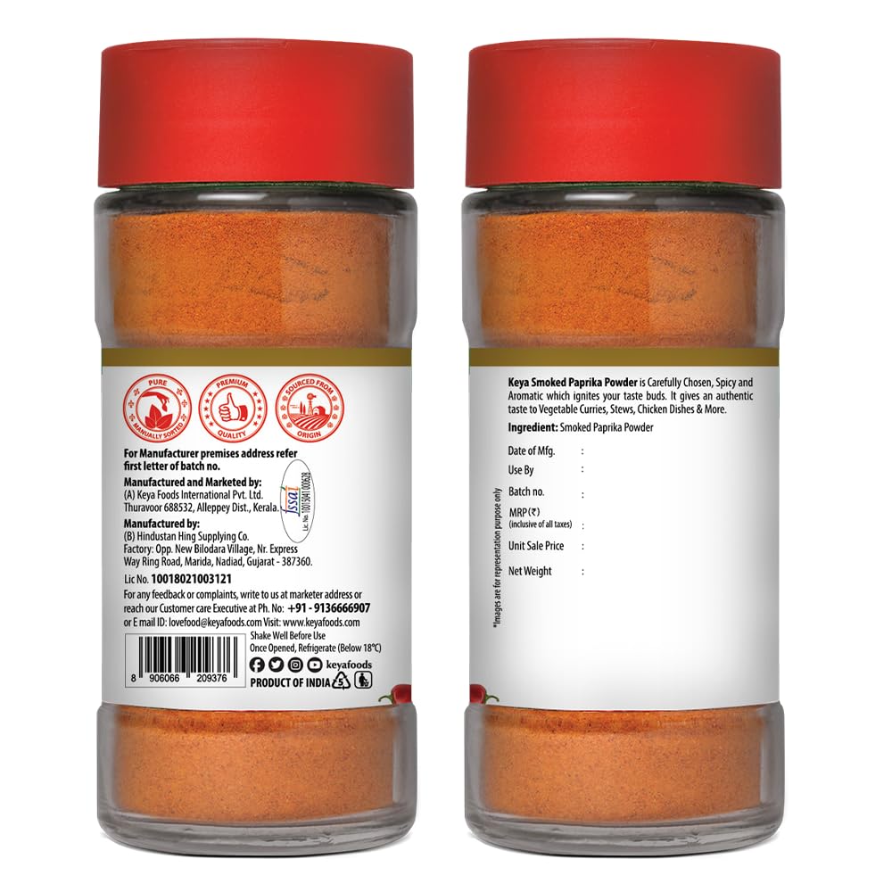 Keya Smoked Paprika Powder in a glass jar, showcasing its rich red color, ready for culinary use. - Image 3