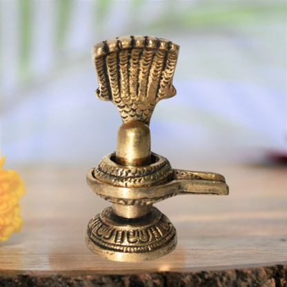Brass Shivling with Sheshnag 175gm - PUSHMYCART