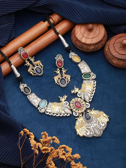 Close-up of the deer motif on the jewellery set