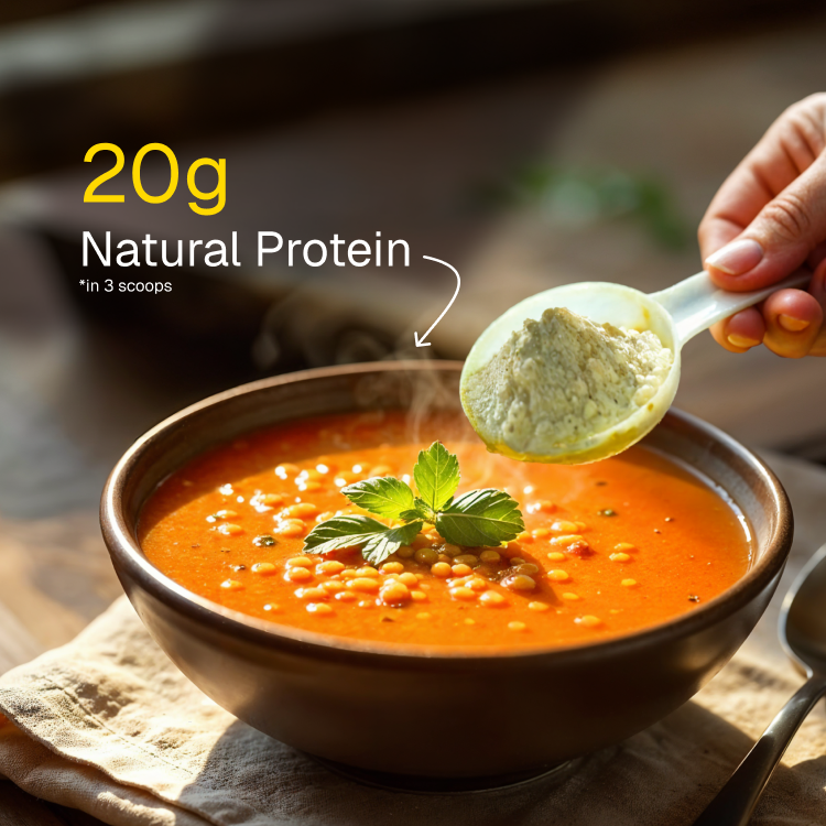 A delicious bowl of lentil dal with Prolicious UP It Natural Protein Enhancer added, showcasing versatile meal enhancement.