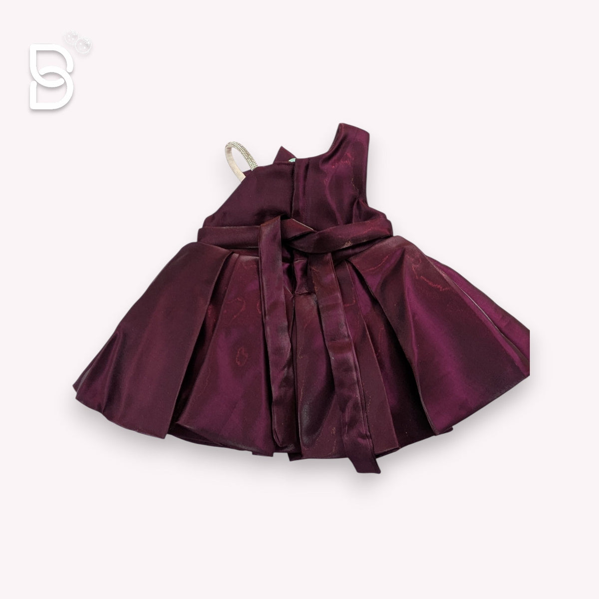 Full view of the voluminous box-pleated skirt