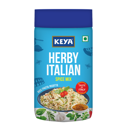 Keyafoods Keya Herby Italian Spice Mix in a clear glass jar with a black lid, surrounded by fresh herbs. - Image 2