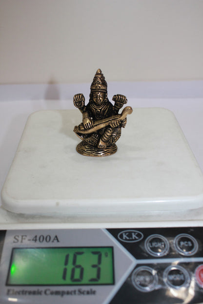 Brass Saraswati Ji Statue 163g - PUSHMYCART